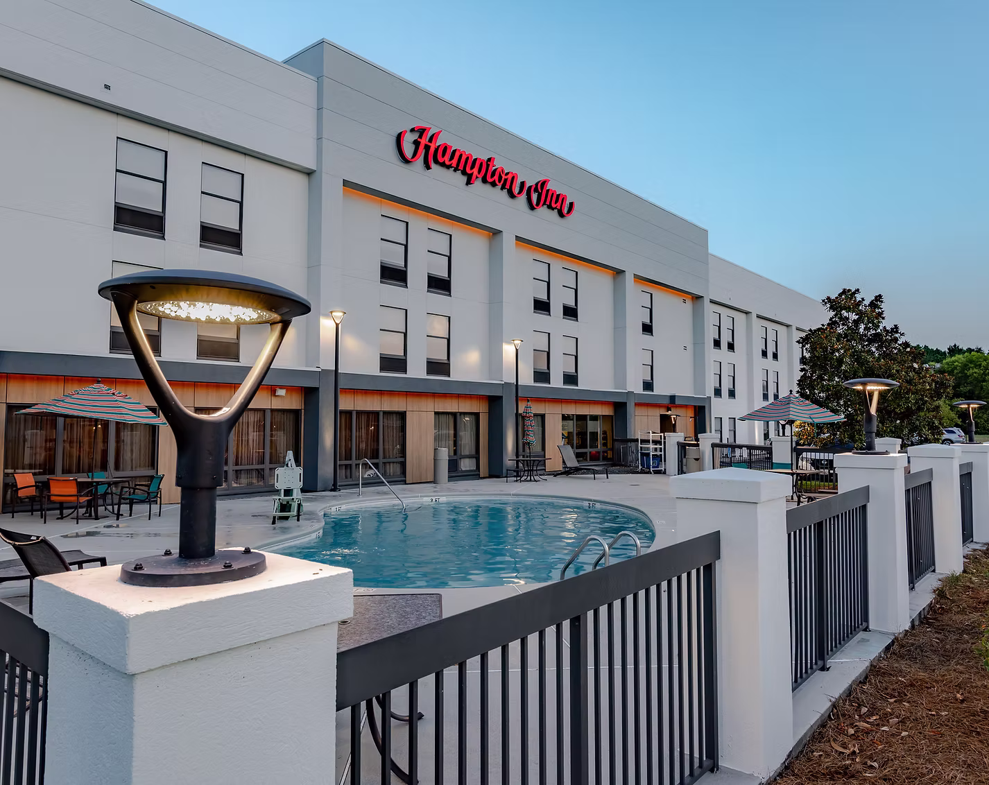 fe8149_00838afdf66f4ddc870d582b157296f7~mv2 hampton inn hotel exterior renovation santee SC
