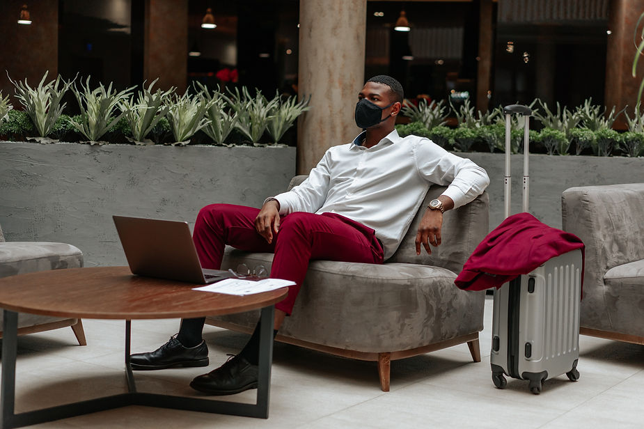 Hotel Guest sitting and working in newly renovated hotel