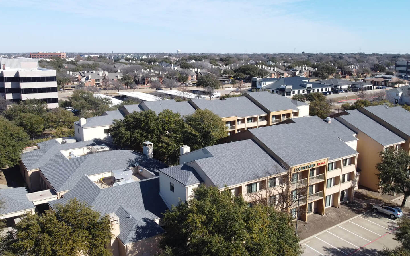 exterior hotel renovation plano texas before